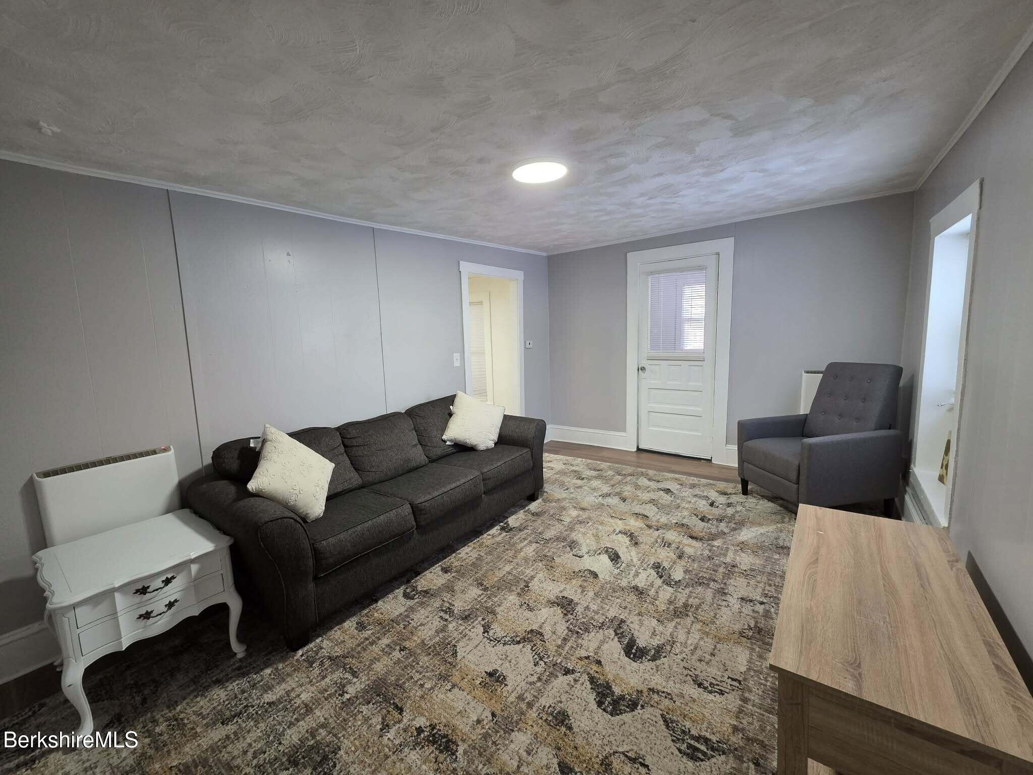 98 L Summer Street Adams, MA 01220 - Photo 14 of 17 a living room with furniture and a couch