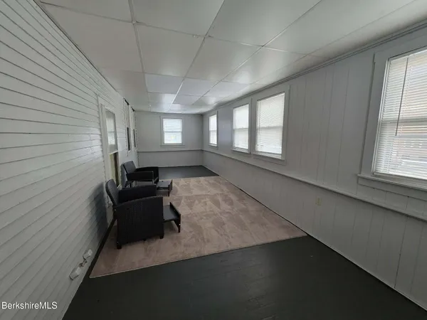 en empty room with windows