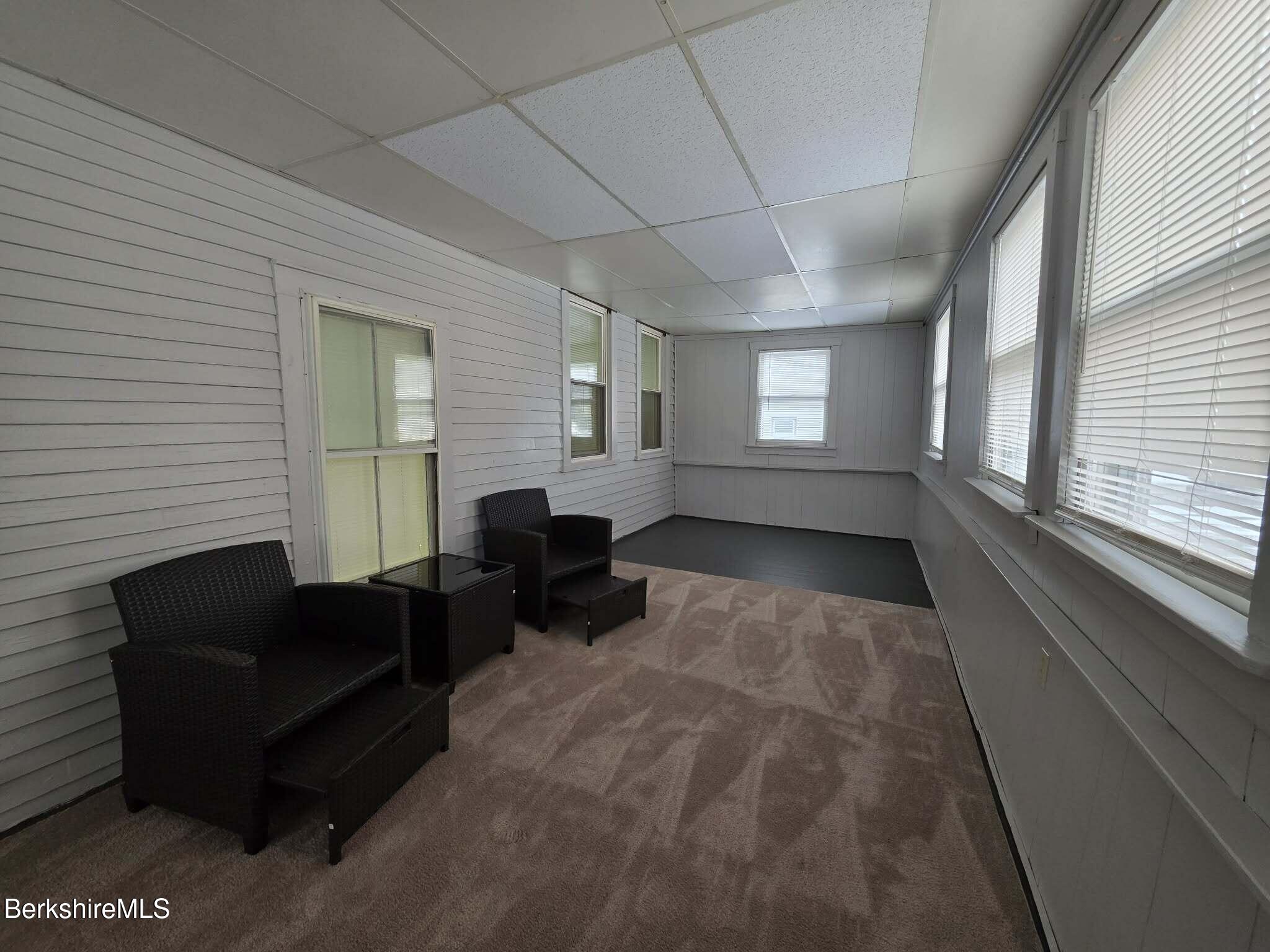 98 L Summer Street Adams, MA 01220 - Photo 16 of 17 a living room with furniture and a large window