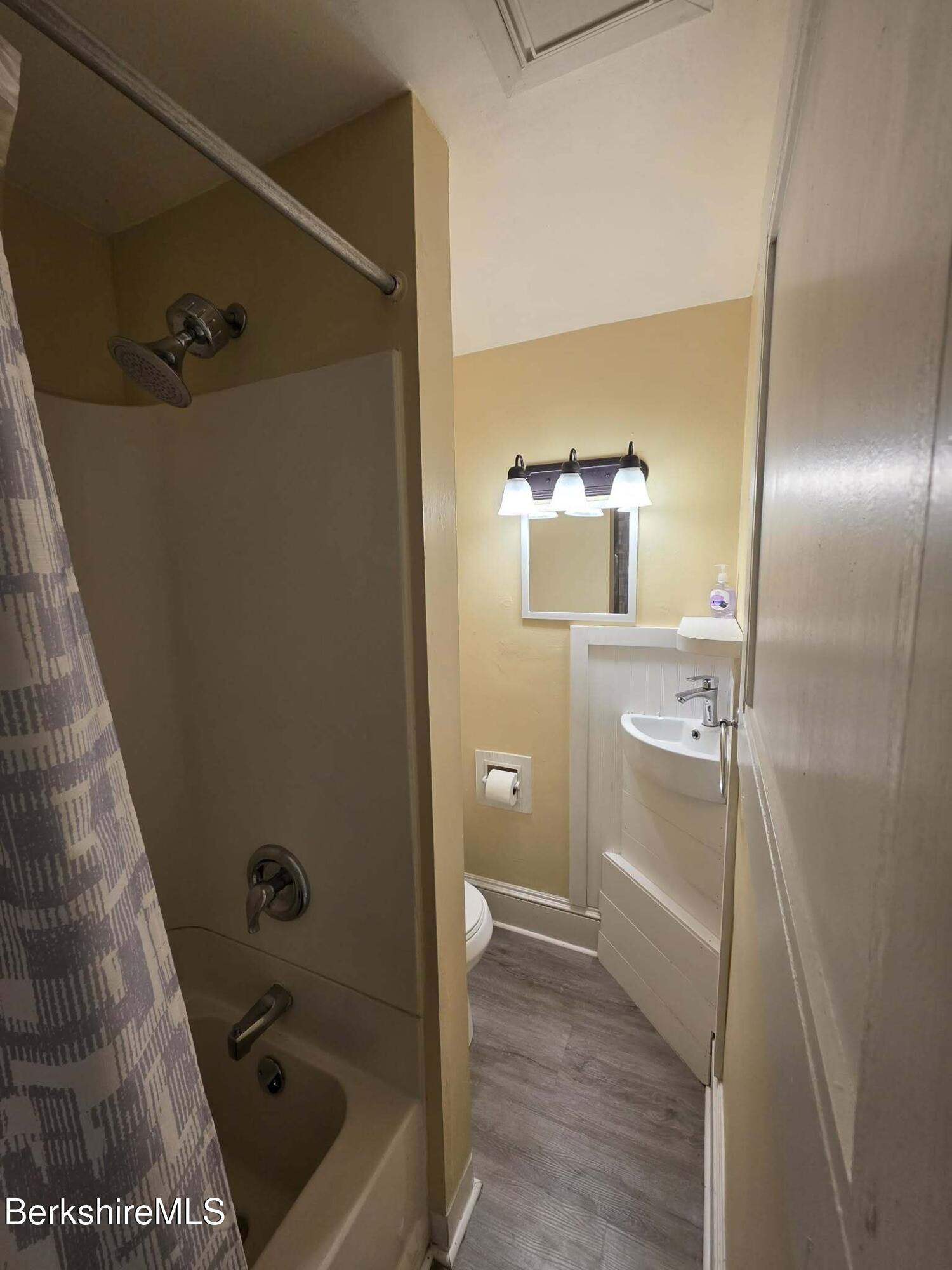 98 L Summer Street Adams, MA 01220 - Photo 6 of 17 a bathroom with a sink and mirror