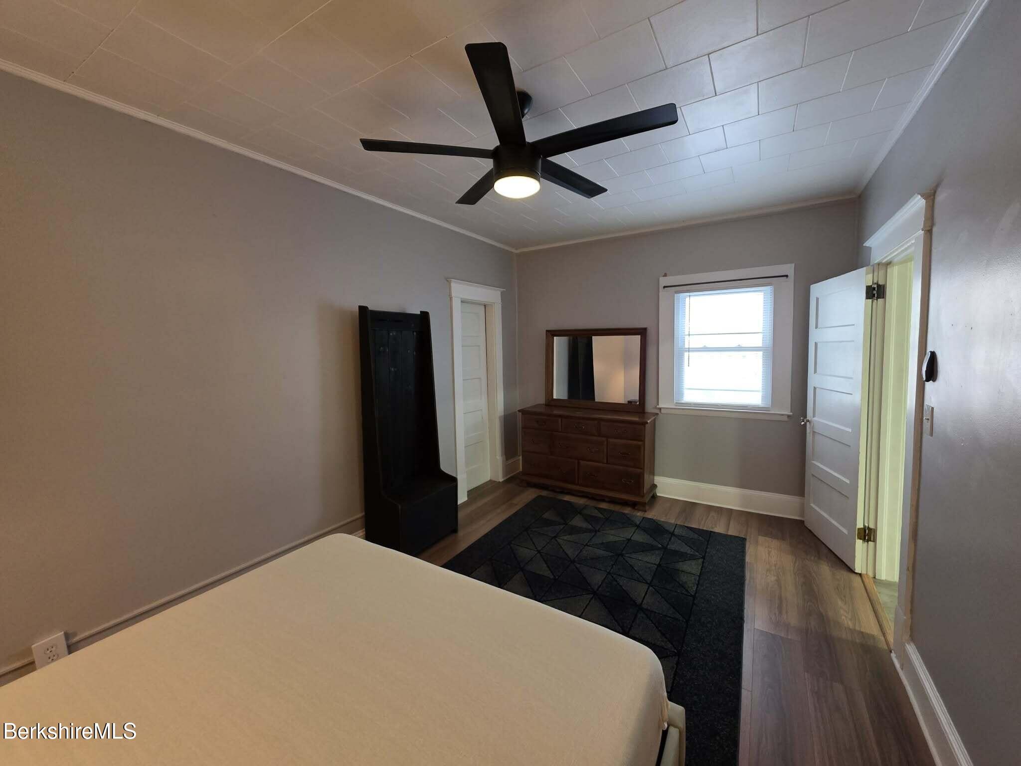 98 L Summer Street Adams, MA 01220 - Photo 9 of 17 a bedroom with a bed and a window