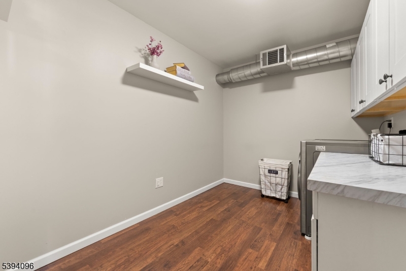 482 Springfield Avenue, Unit 2 Berkeley Heights, NJ 07922 - Photo 12 of 20 a room with storage and utility