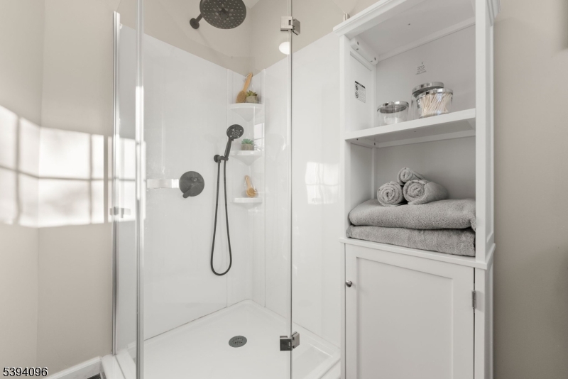 482 Springfield Avenue, Unit 2 Berkeley Heights, NJ 07922 - Photo 16 of 20 a bathroom with a shower sink