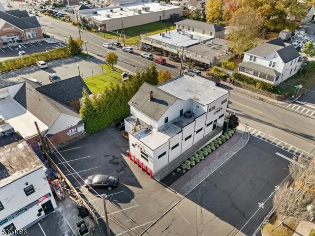 an aerial view of a house with a garden