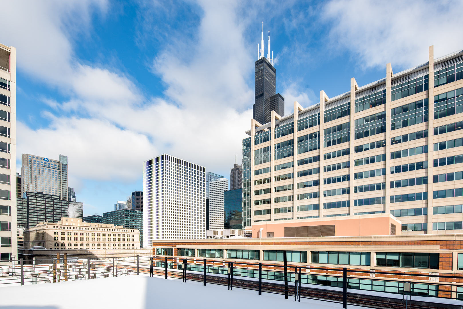 420 South Clinton Street, Unit 306A Chicago, IL 60607 - Photo 18 of 18 a front view of a building with glass door