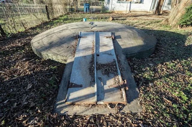 a view of a backyard of a house