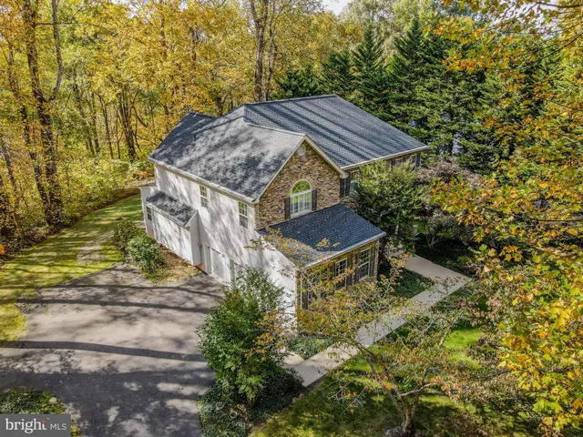 a aerial view of a house with a yard
