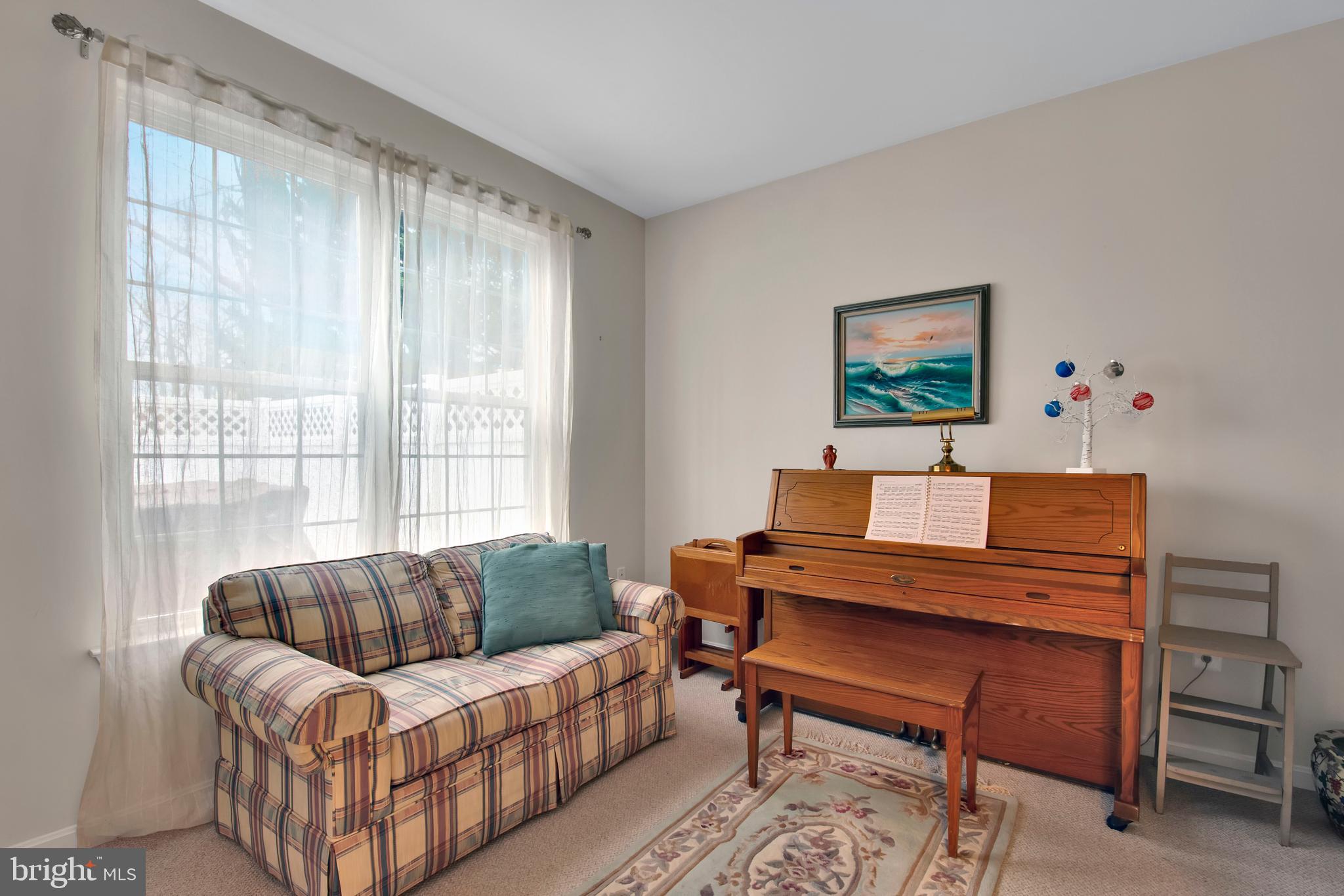 5534 Nutwell Sudley Road Deale, MD 20751 - Photo 21 of 51 a living room with furniture and a window