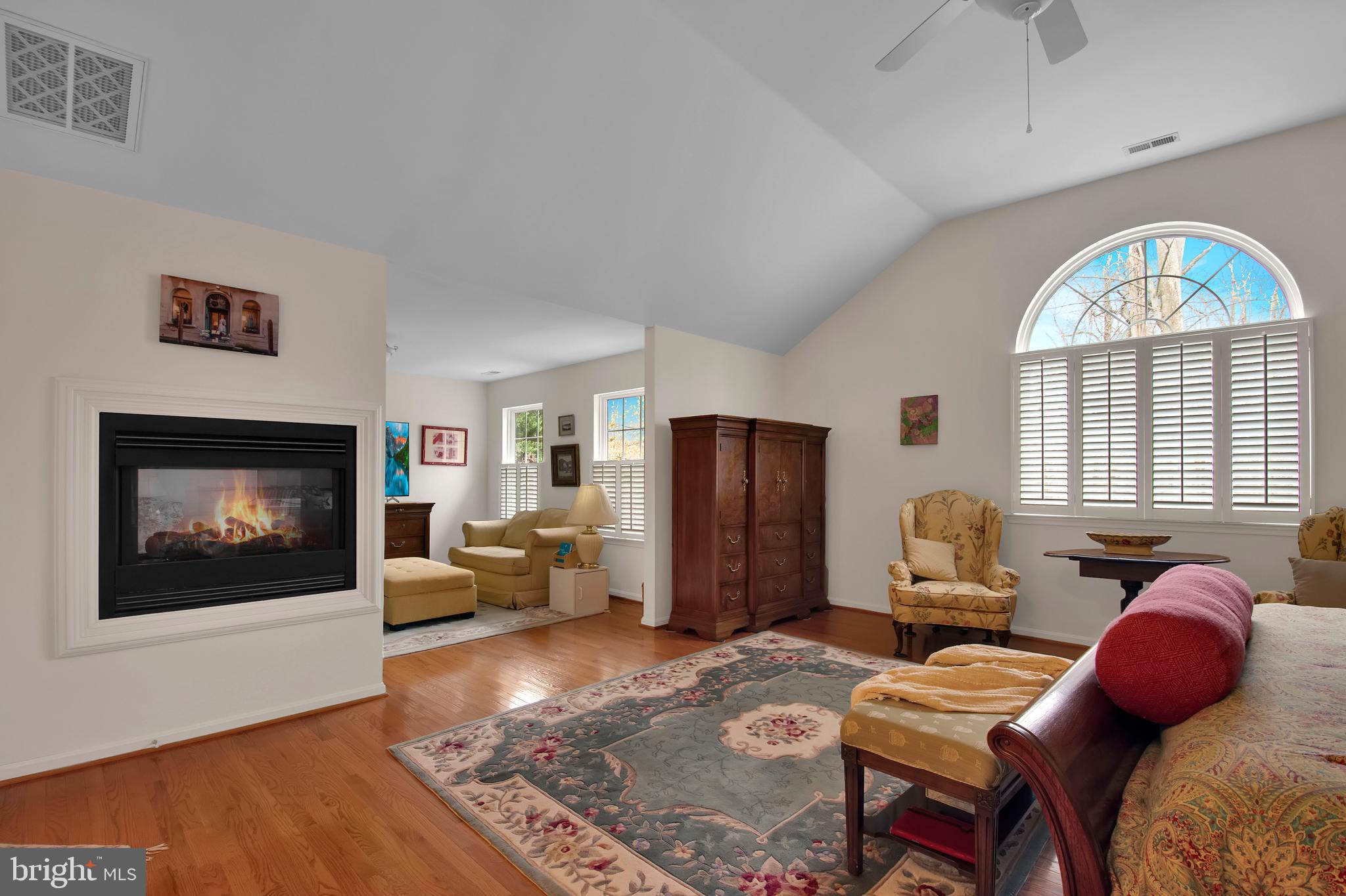 5534 Nutwell Sudley Road Deale, MD 20751 - Photo 29 of 51 a living room with furniture fireplace and a flat screen tv