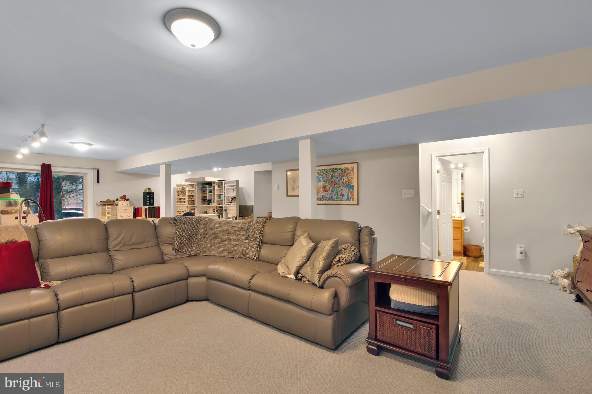 5534 Nutwell Sudley Road Deale, MD 20751 - Photo 34 of 51 a living room with furniture and a table