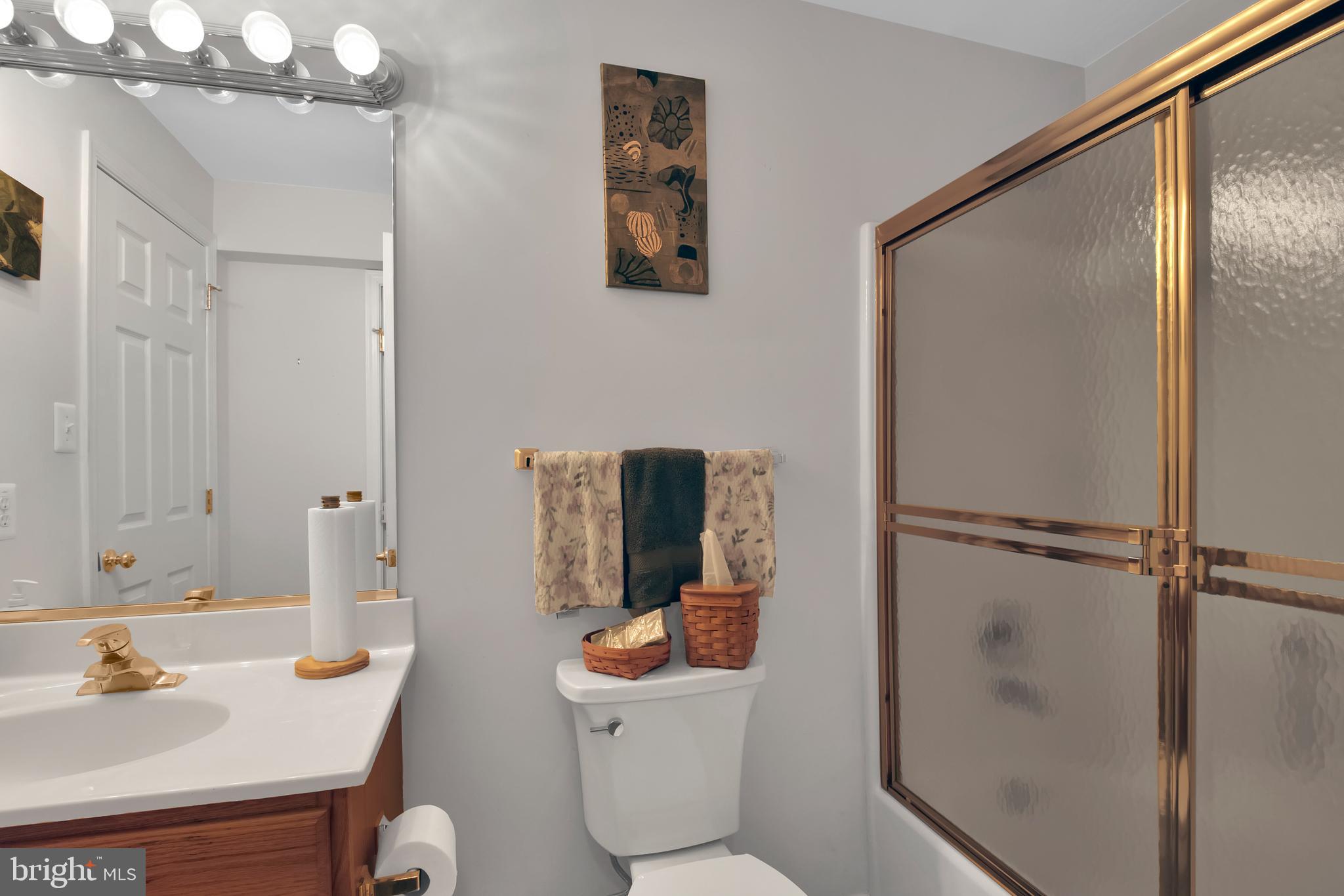 5534 Nutwell Sudley Road Deale, MD 20751 - Photo 35 of 51 a bathroom with a sink toilet and shower