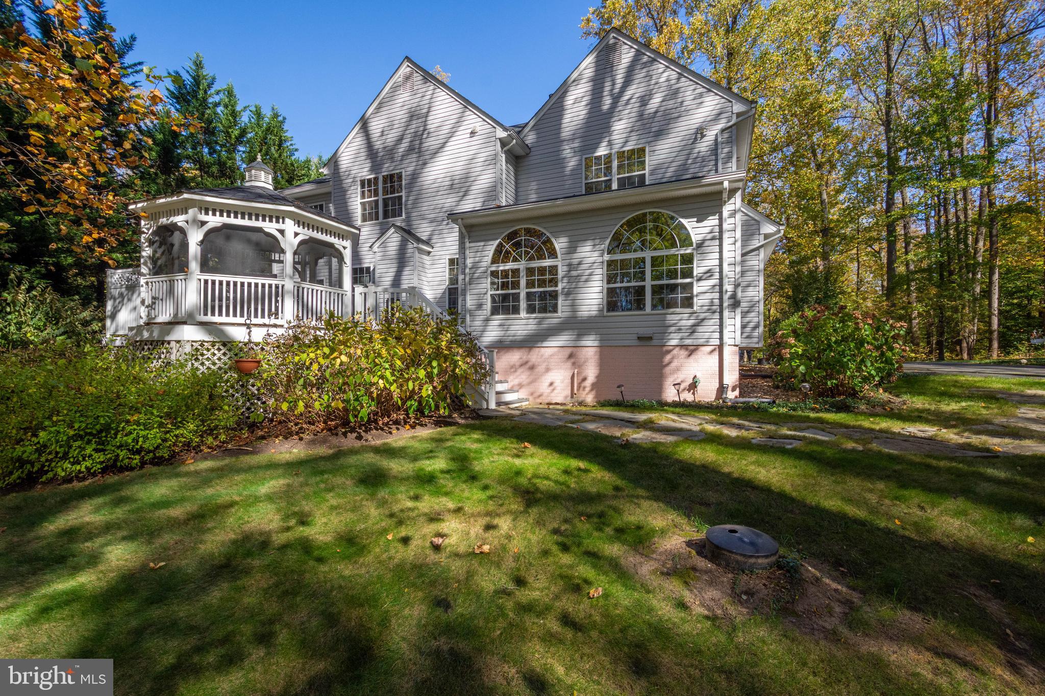 5534 Nutwell Sudley Road Deale, MD 20751 - Photo 41 of 51 a front view of house with yard and green space