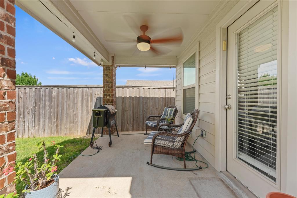 409 Harding Lane Lavon, TX 75166 - Photo 25 of 34 Covered patio featuring a ceiling fan, recessed lighting, and brick support columns