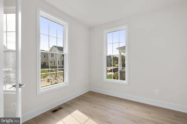 an empty room with windows