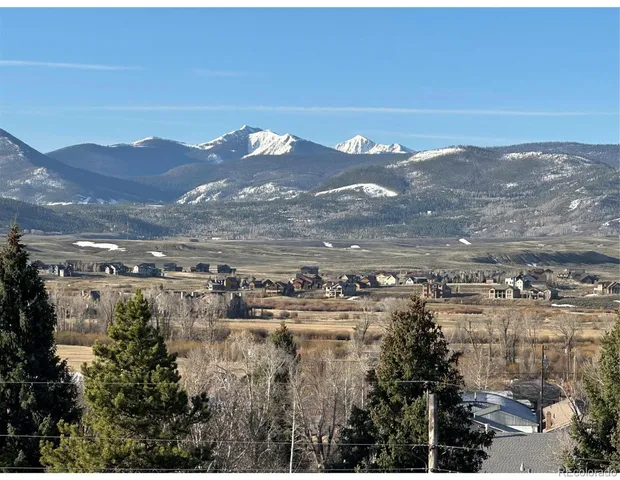 a view of city and mountain