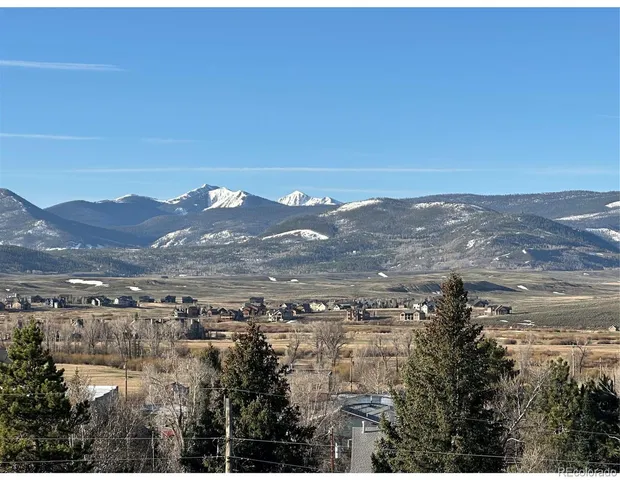 a view of city and mountain