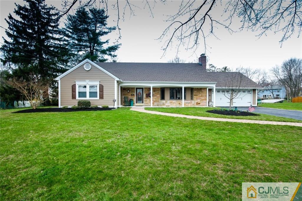 32 Summerall Road Somerset, NJ 08873 - Photo 1 of 17 a front view of a house with a yard