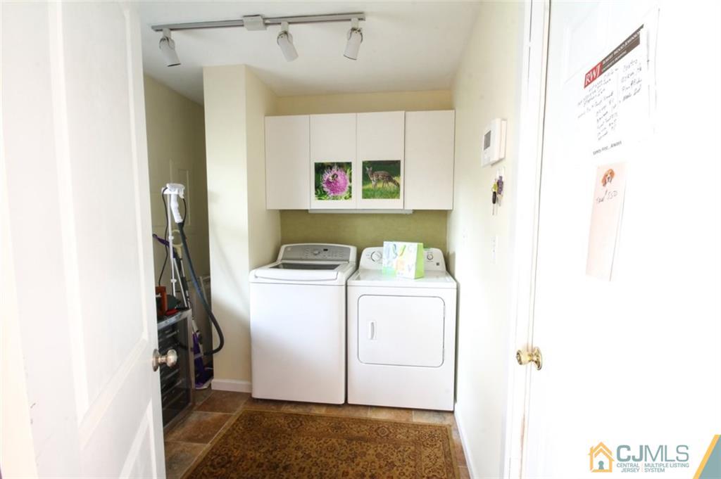 32 Summerall Road Somerset, NJ 08873 - Photo 11 of 17 a utility room with dryer and washer