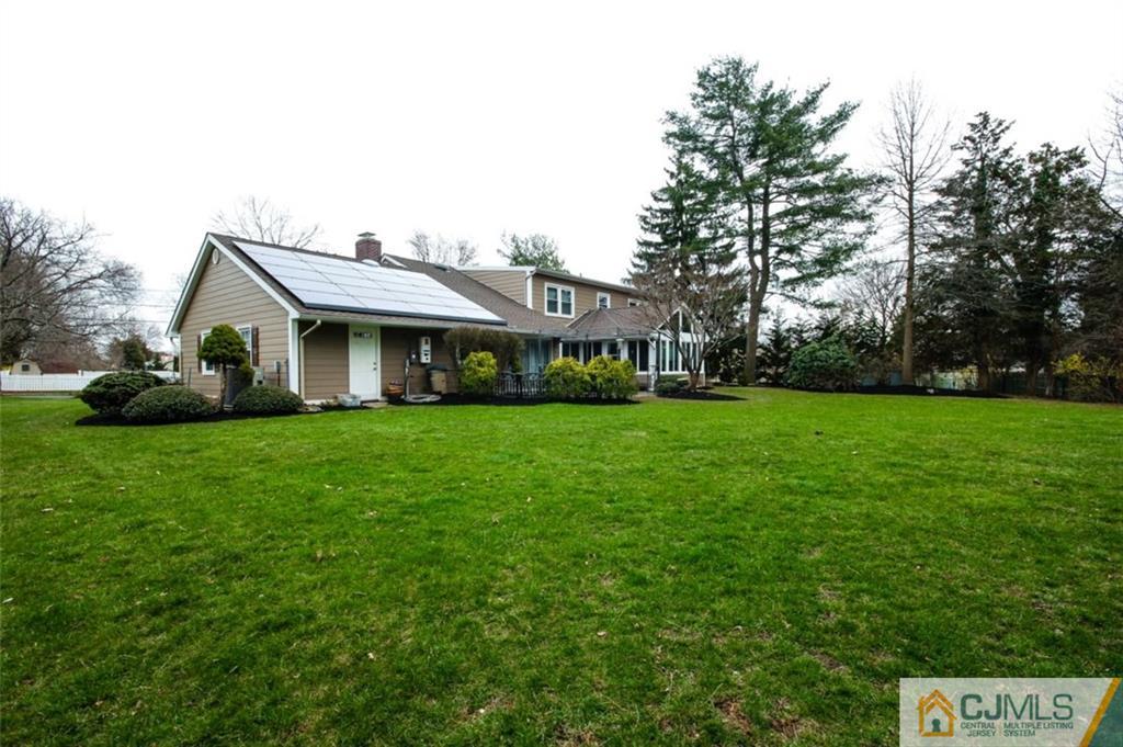 32 Summerall Road Somerset, NJ 08873 - Photo 17 of 17 a front view of a house with garden