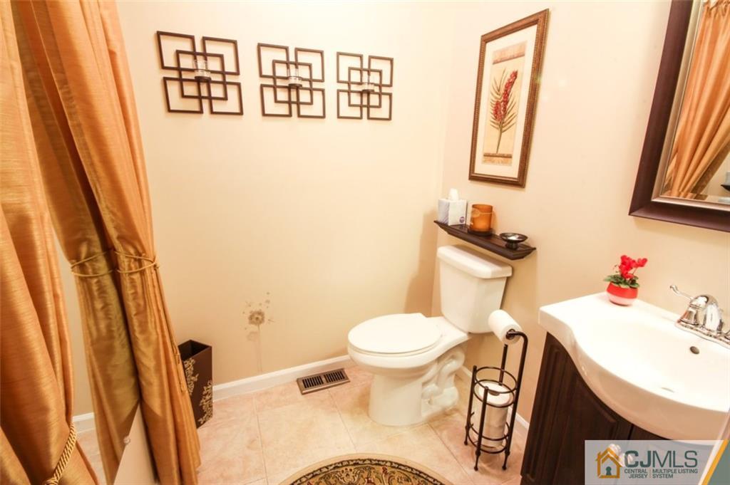 32 Summerall Road Somerset, NJ 08873 - Photo 9 of 17 a bathroom with a sink and a toilet