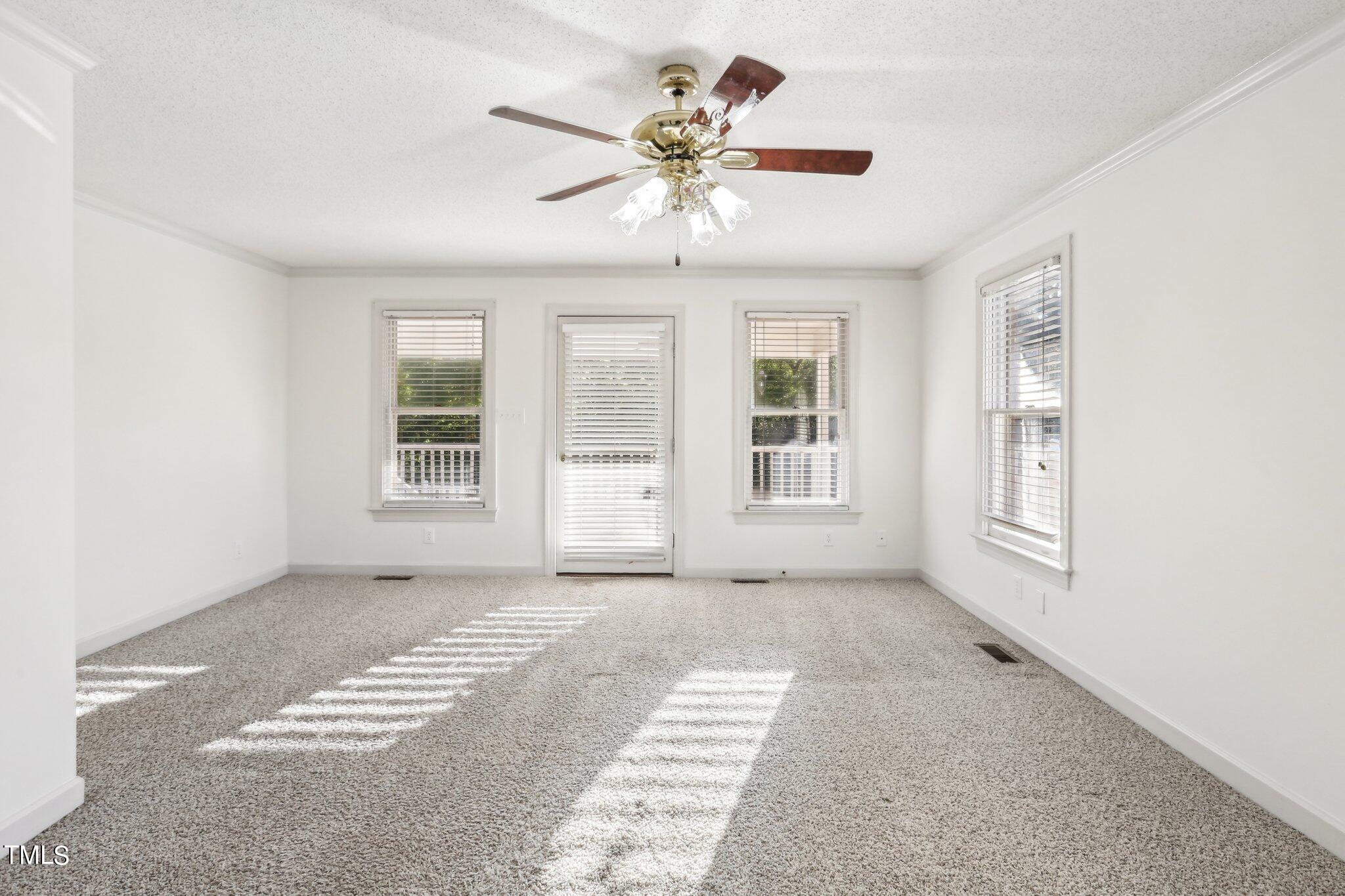 1517 Crickett Road Raleigh, NC 27610 - Photo 23 of 41 a view of an empty room with a window