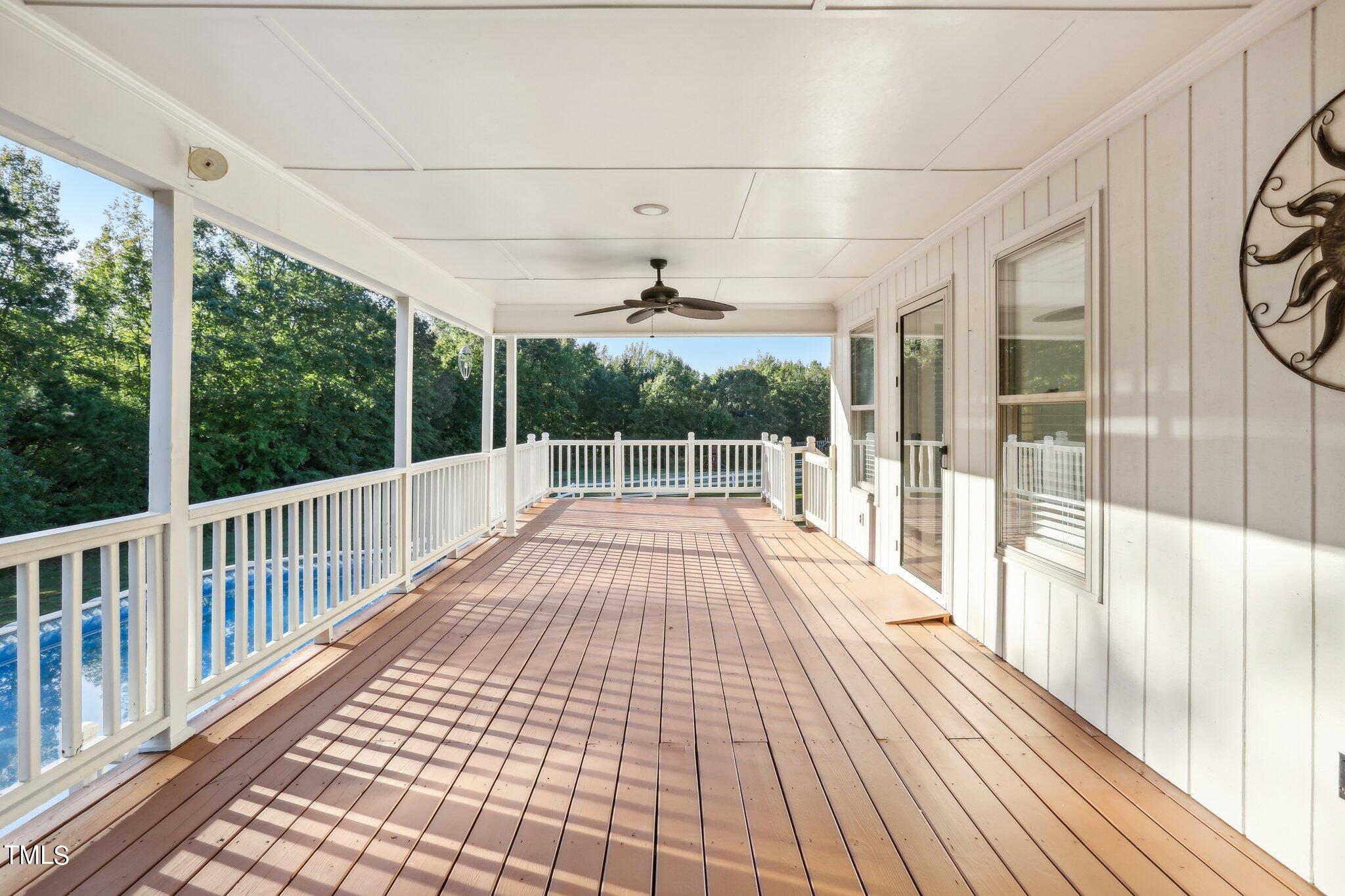 1517 Crickett Road Raleigh, NC 27610 - Photo 30 of 41 a view of a balcony with wooden floor