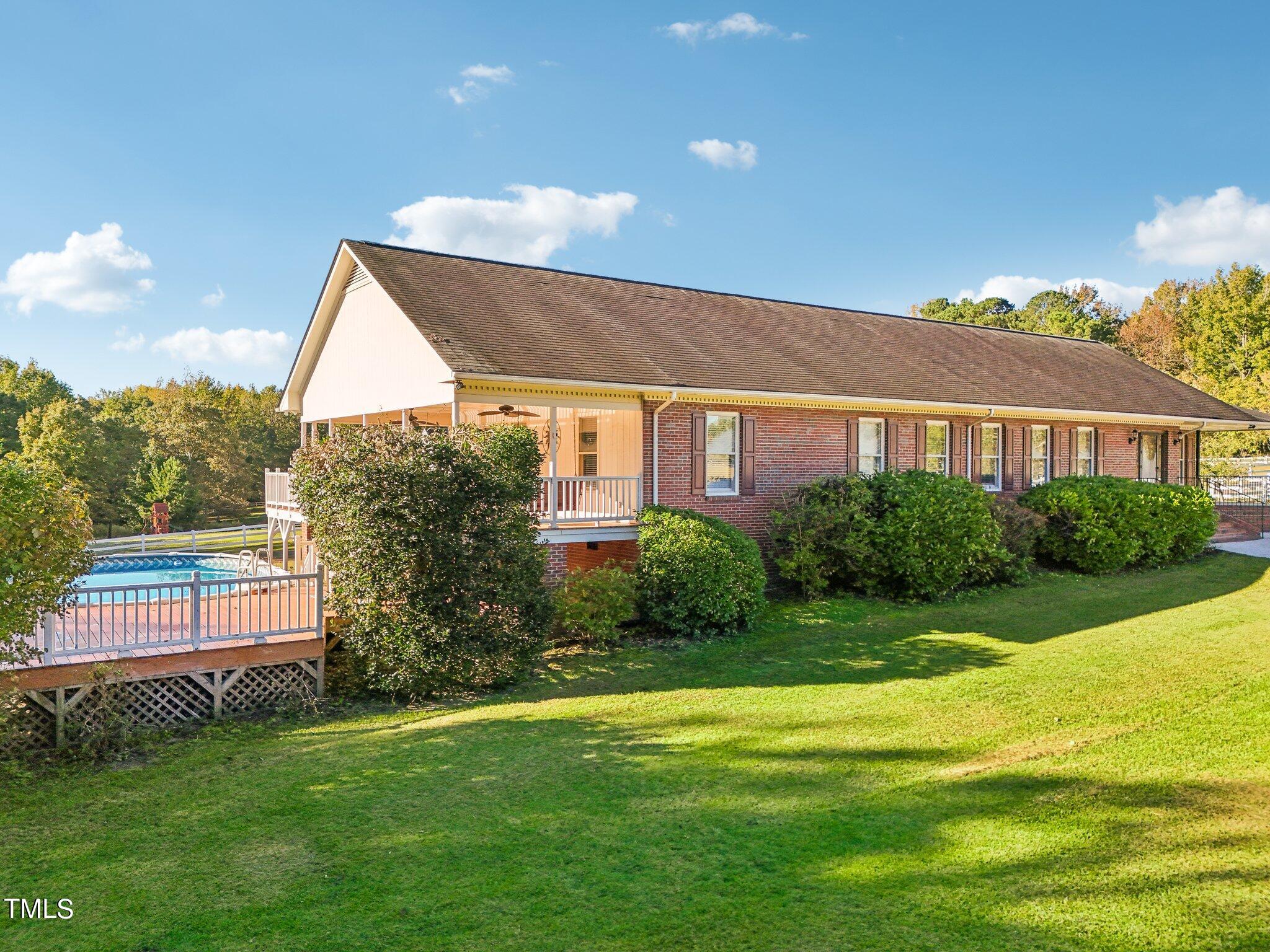 1517 Crickett Road Raleigh, NC 27610 - Photo 34 of 41 a front view of a house with garden
