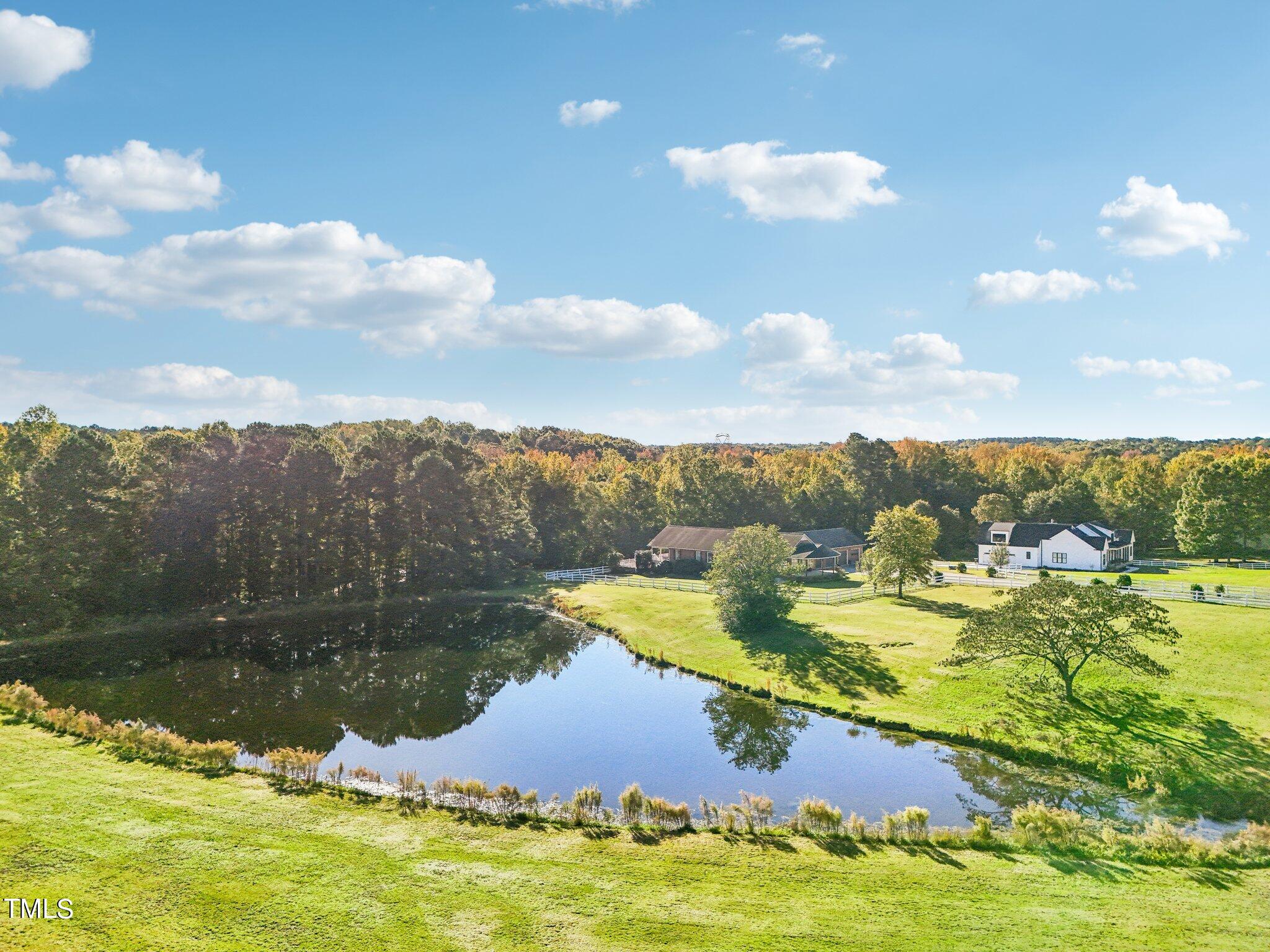 1517 Crickett Road Raleigh, NC 27610 - Photo 38 of 41 a view of a lake with a mountain