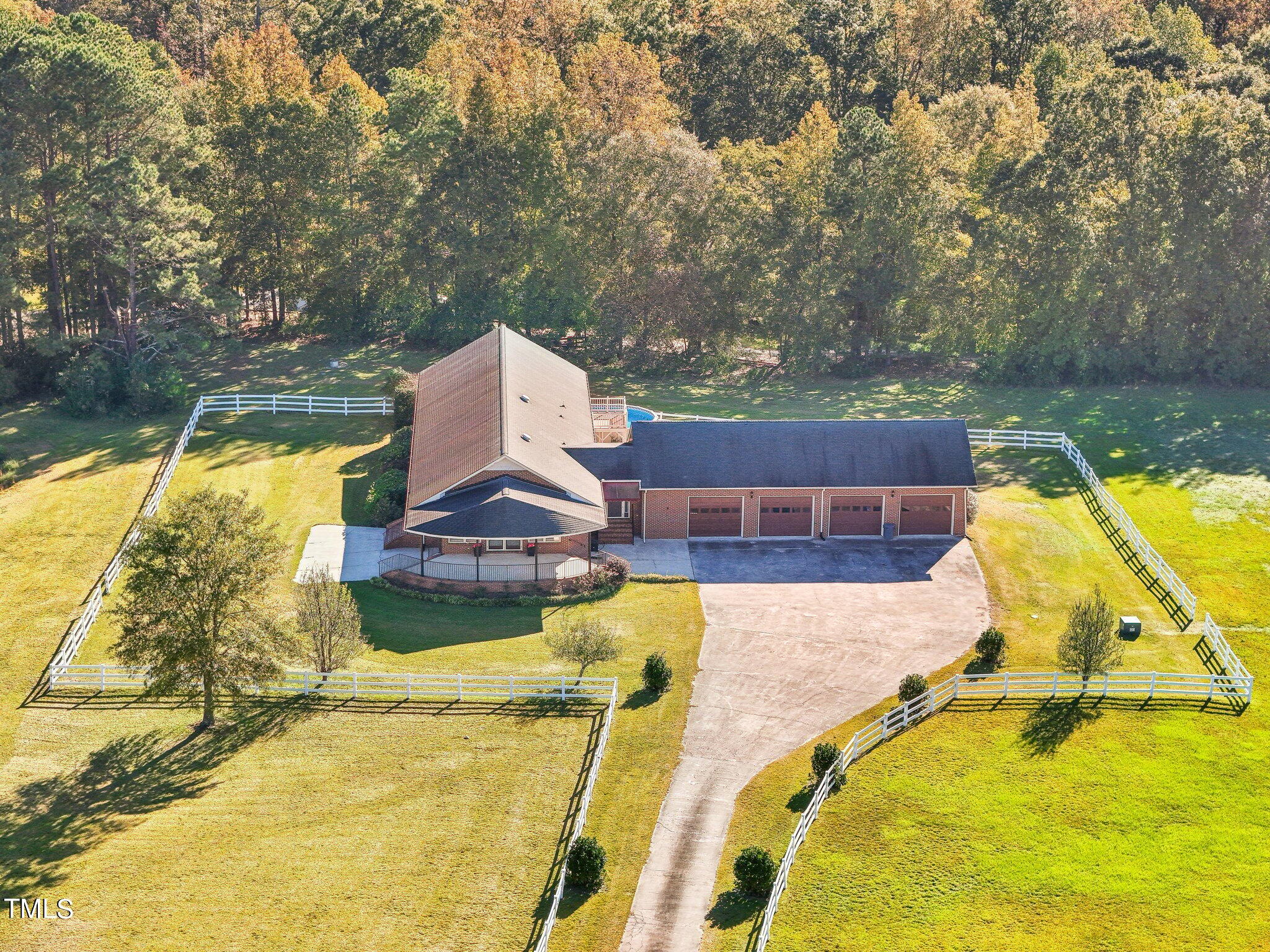 1517 Crickett Road Raleigh, NC 27610 - Photo 4 of 41 a view of a swimming pool with a patio