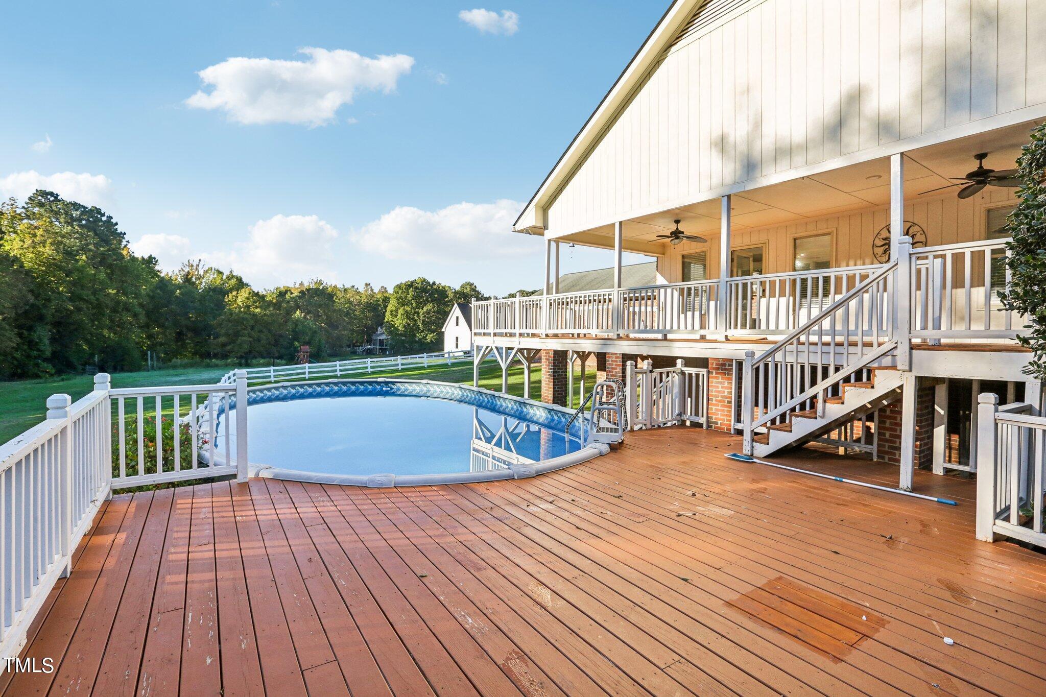 1517 Crickett Road Raleigh, NC 27610 - Photo 41 of 41 a view of balcony with deck and wooden floor