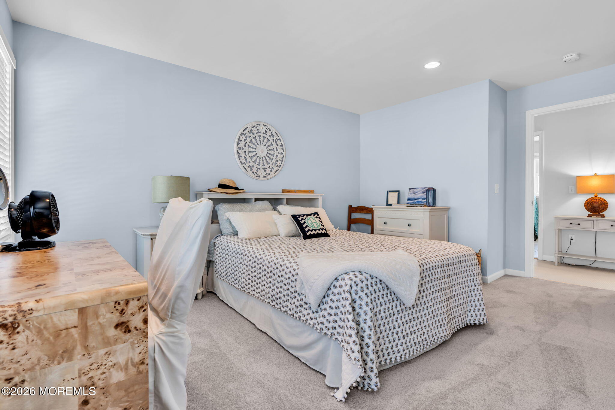 2404 Chestnut Street Point Pleasant, NJ 08742 - Photo 11 of 16 a bedroom with a bed and wooden floor