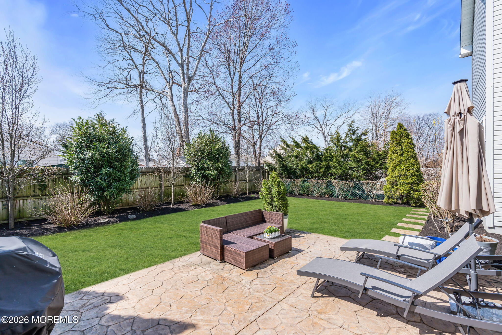 2404 Chestnut Street Point Pleasant, NJ 08742 - Photo 13 of 16 a garden view with a seating space