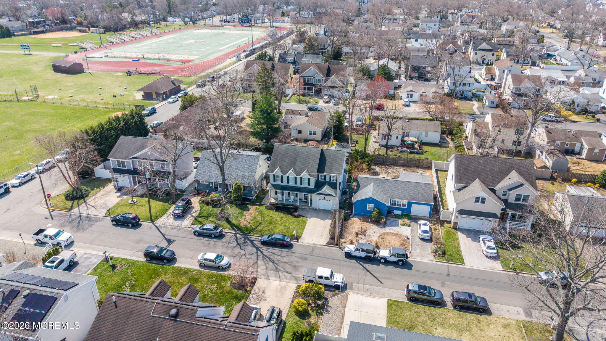 2404 Chestnut Street Point Pleasant, NJ 08742 - Photo 16 of 16 an aerial view of a house with a swimming pool
