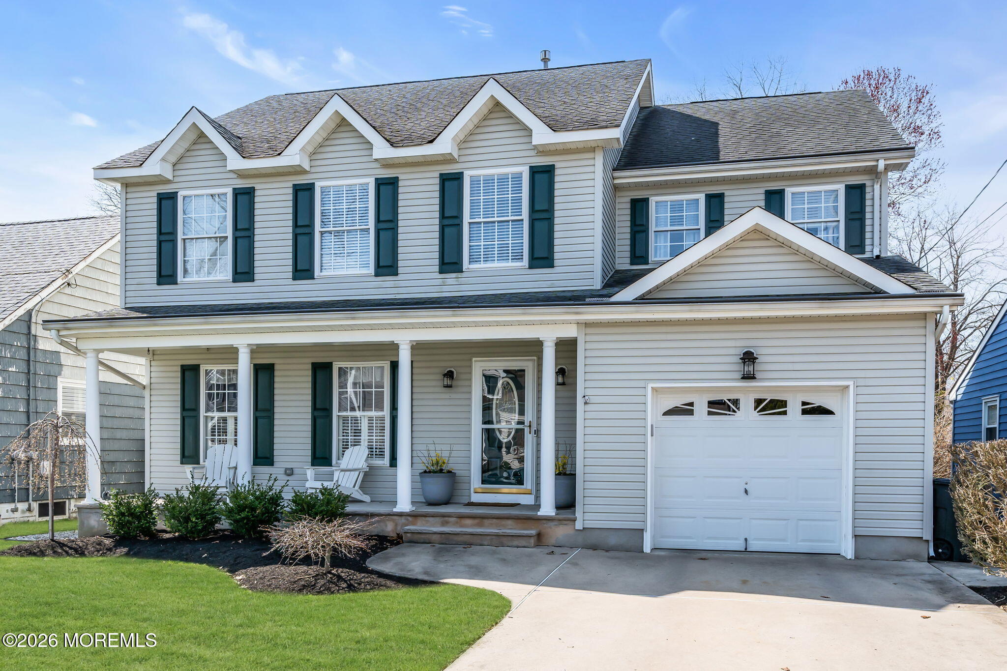 2404 Chestnut Street Point Pleasant, NJ 08742 - Photo 2 of 16 front view of a house with a yard