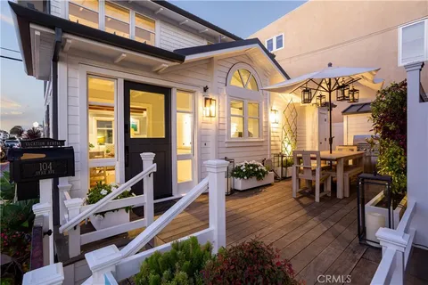a view of a balcony with chairs
