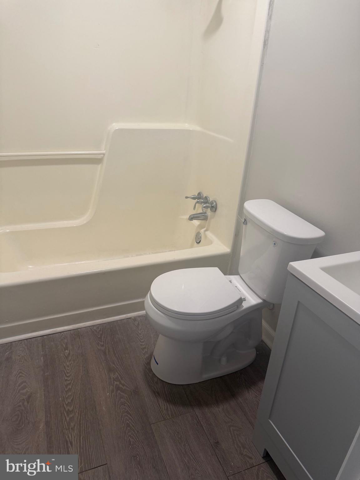 139 Spruance Road Dover, DE 19901 - Photo 13 of 20 a white toilet sitting next to a bath tub