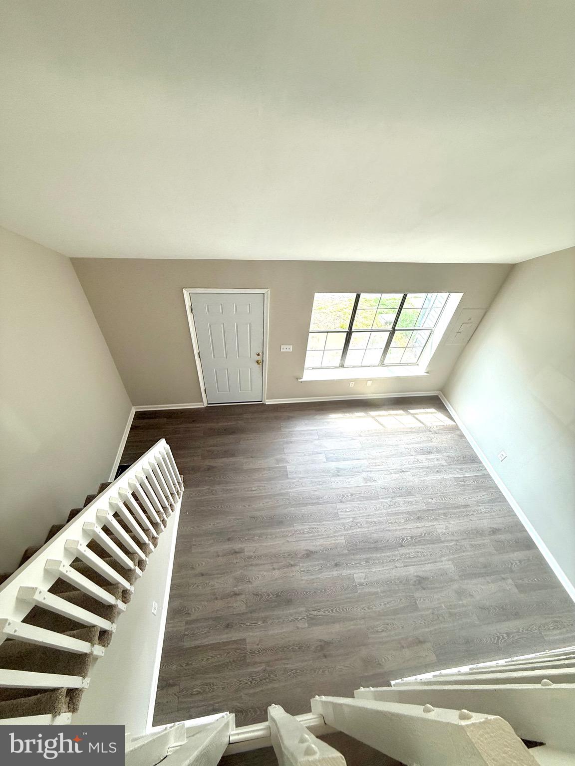 139 Spruance Road Dover, DE 19901 - Photo 19 of 20 a view of wooden floor and stairs