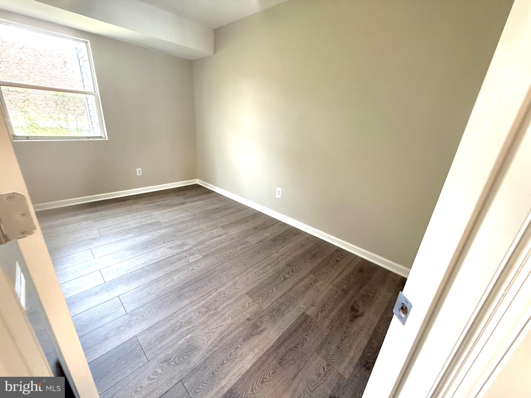 139 Spruance Road Dover, DE 19901 - Photo 4 of 20 a view of an empty room and wooden floor