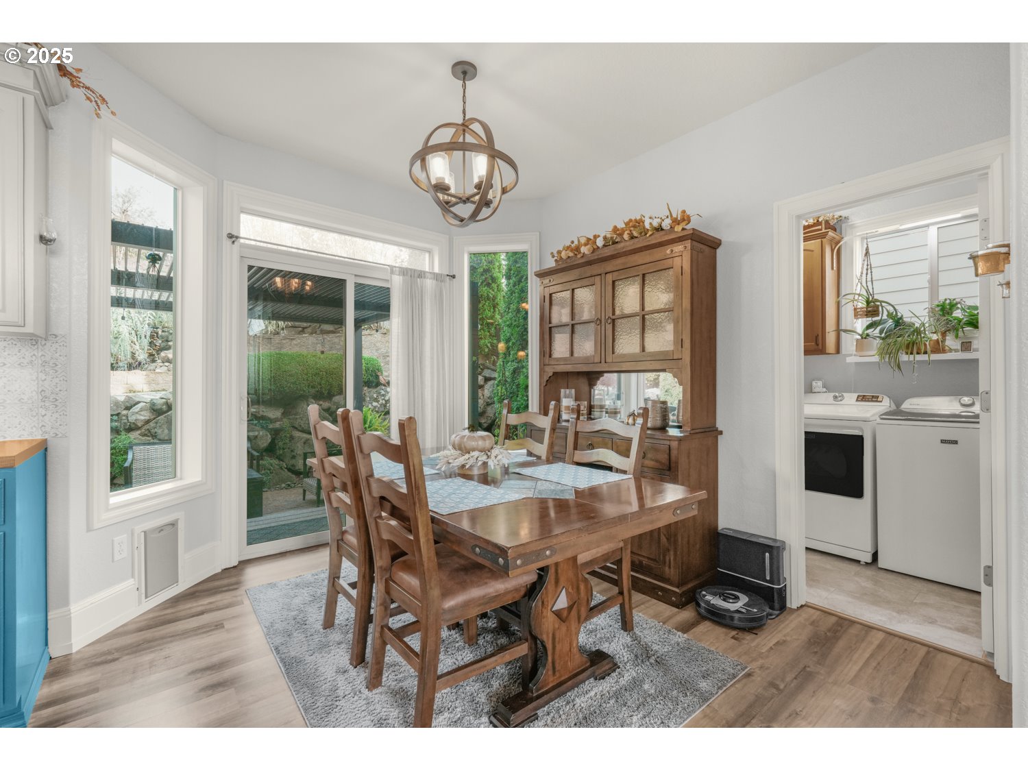 3561 Z Street Washougal, WA 98671 - Photo 18 of 41 a view of a dining room with furniture window and wooden floor