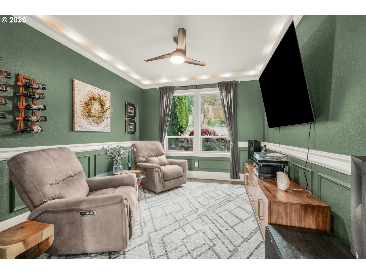 3561 Z Street Washougal, WA 98671 - Photo 19 of 41 a living room with furniture a flat screen tv and a large window