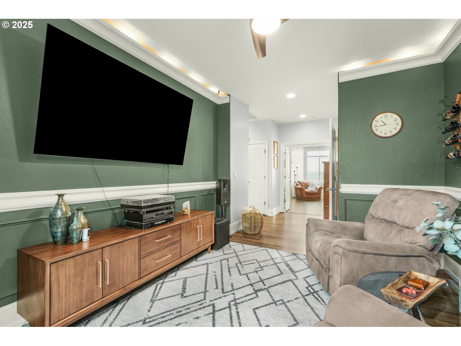 3561 Z Street Washougal, WA 98671 - Photo 20 of 41 a living room with furniture and a flat screen tv