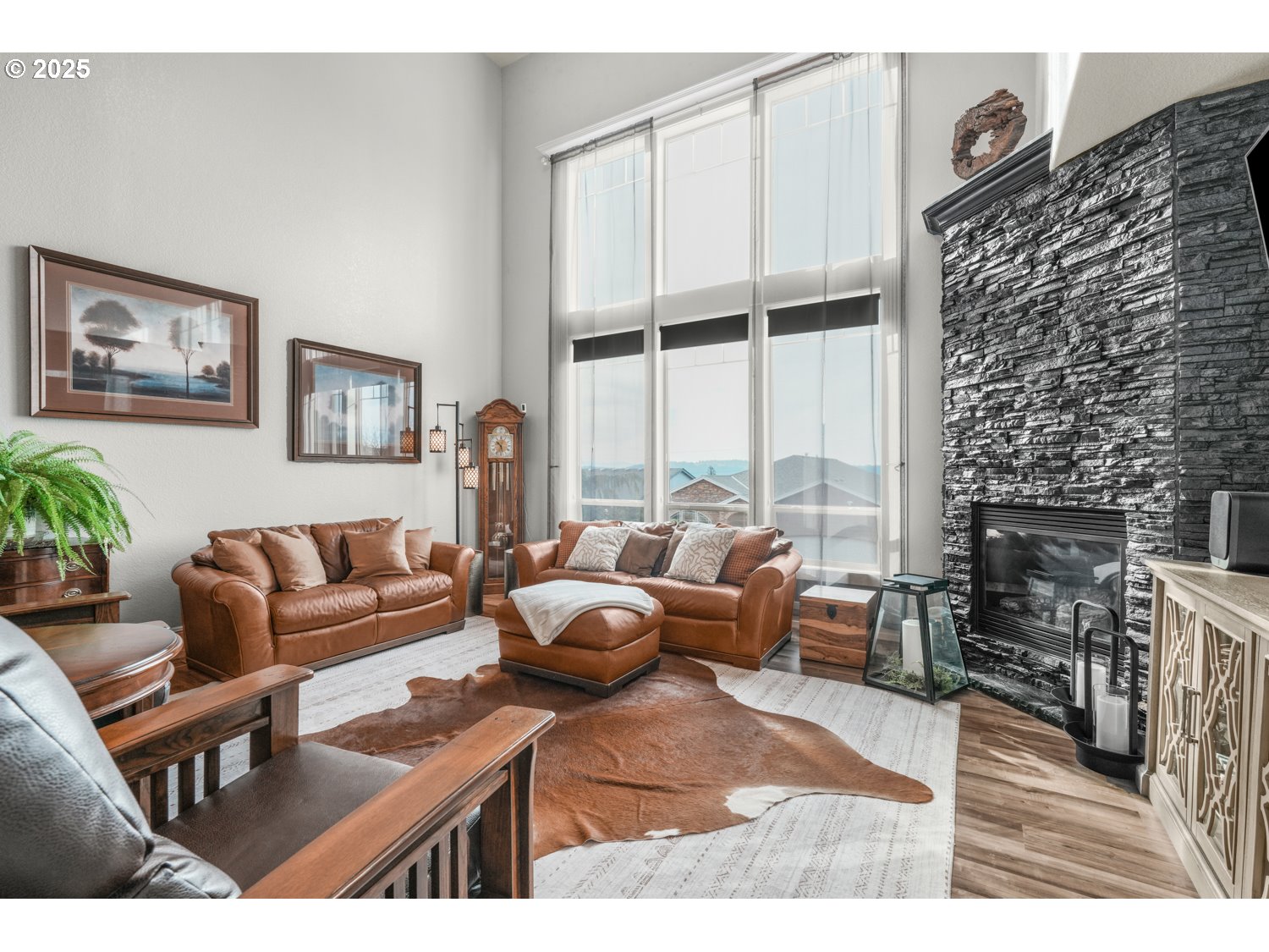 3561 Z Street Washougal, WA 98671 - Photo 7 of 41 a living room with furniture wooden floor and a fireplace