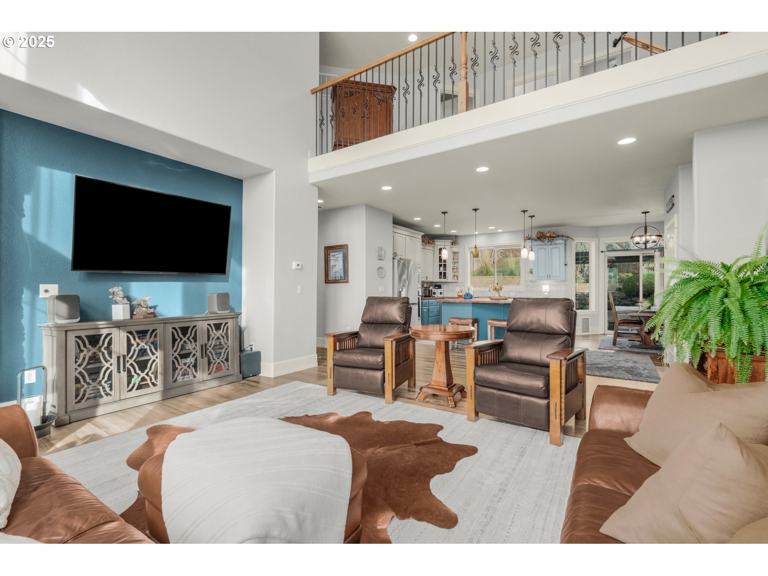 3561 Z Street Washougal, WA 98671 - Photo 10 of 41 a living room with furniture and a flat screen tv