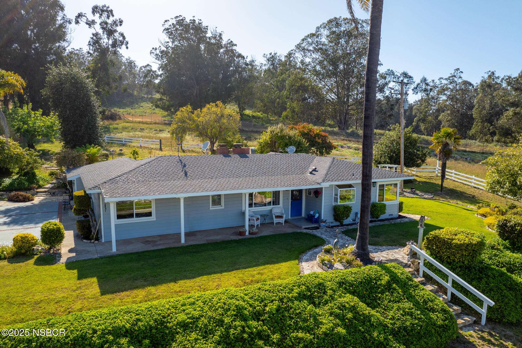 4314 West Ocean Avenue Lompoc, CA 93436 - Photo 15 of 58 a view of a house with swimming pool next to a yard