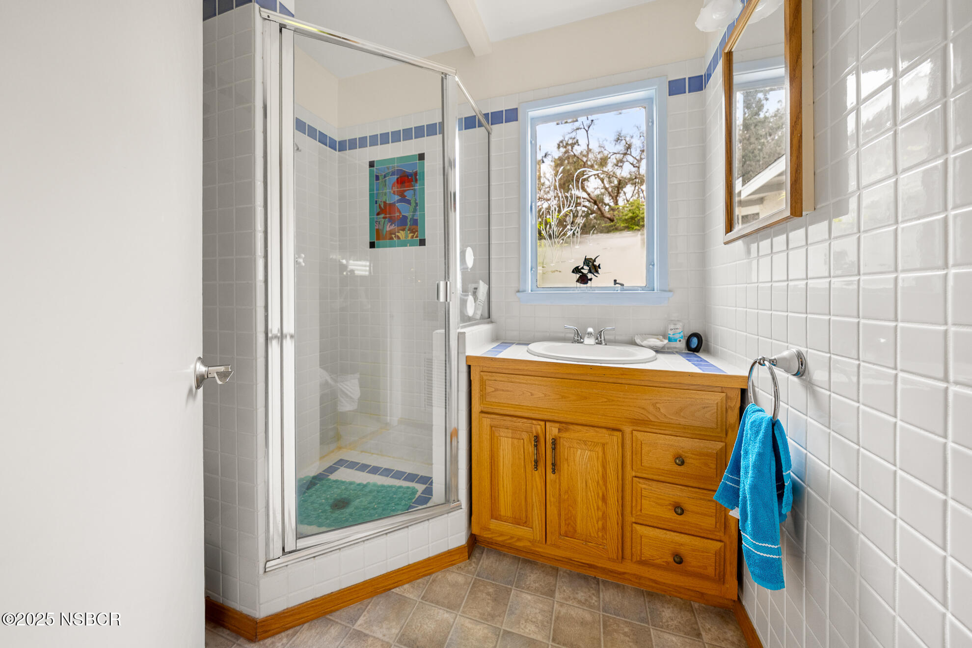 4314 West Ocean Avenue Lompoc, CA 93436 - Photo 21 of 58 a bathroom with a tub and a sink