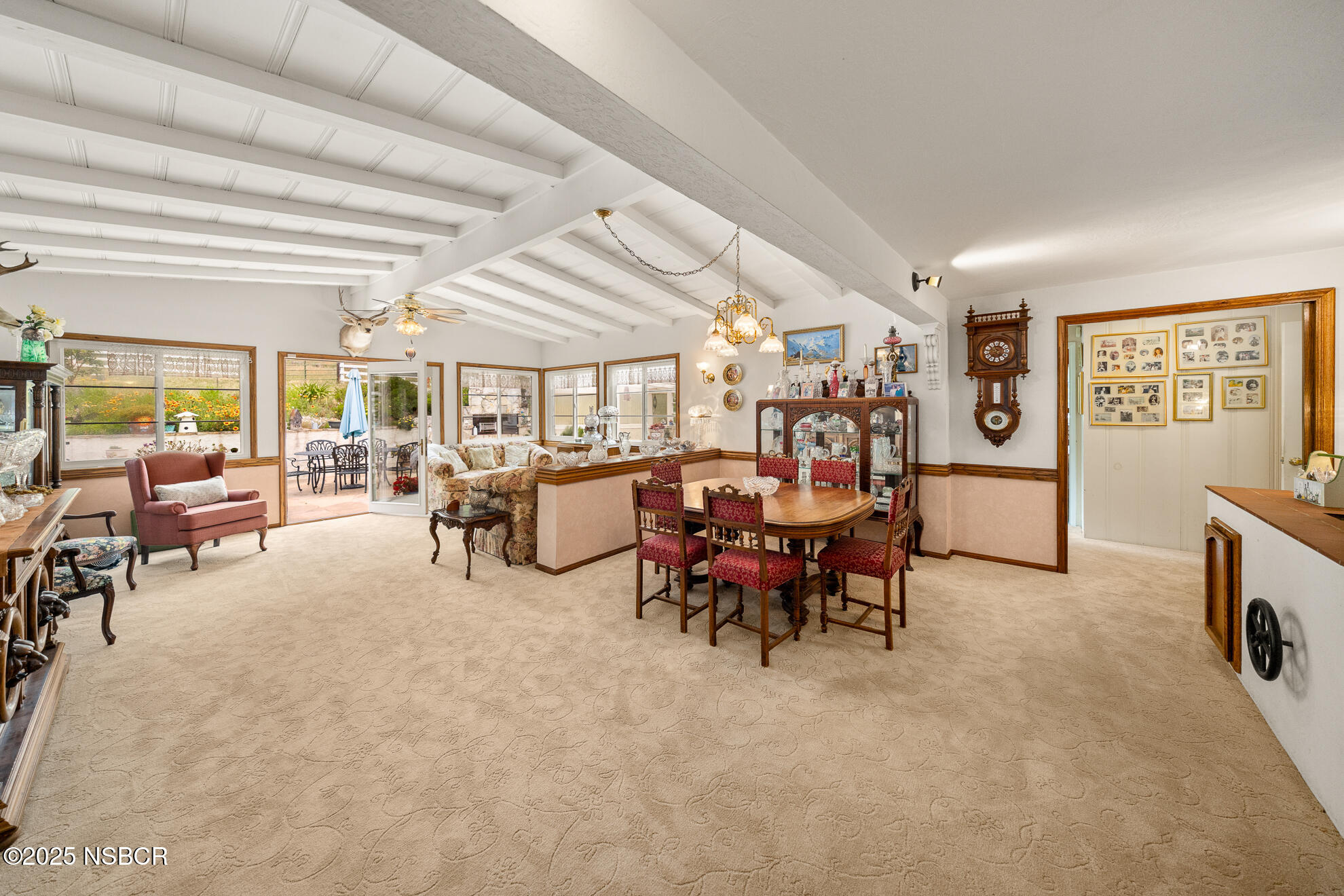 4314 West Ocean Avenue Lompoc, CA 93436 - Photo 22 of 58 a living room with furniture and a large window