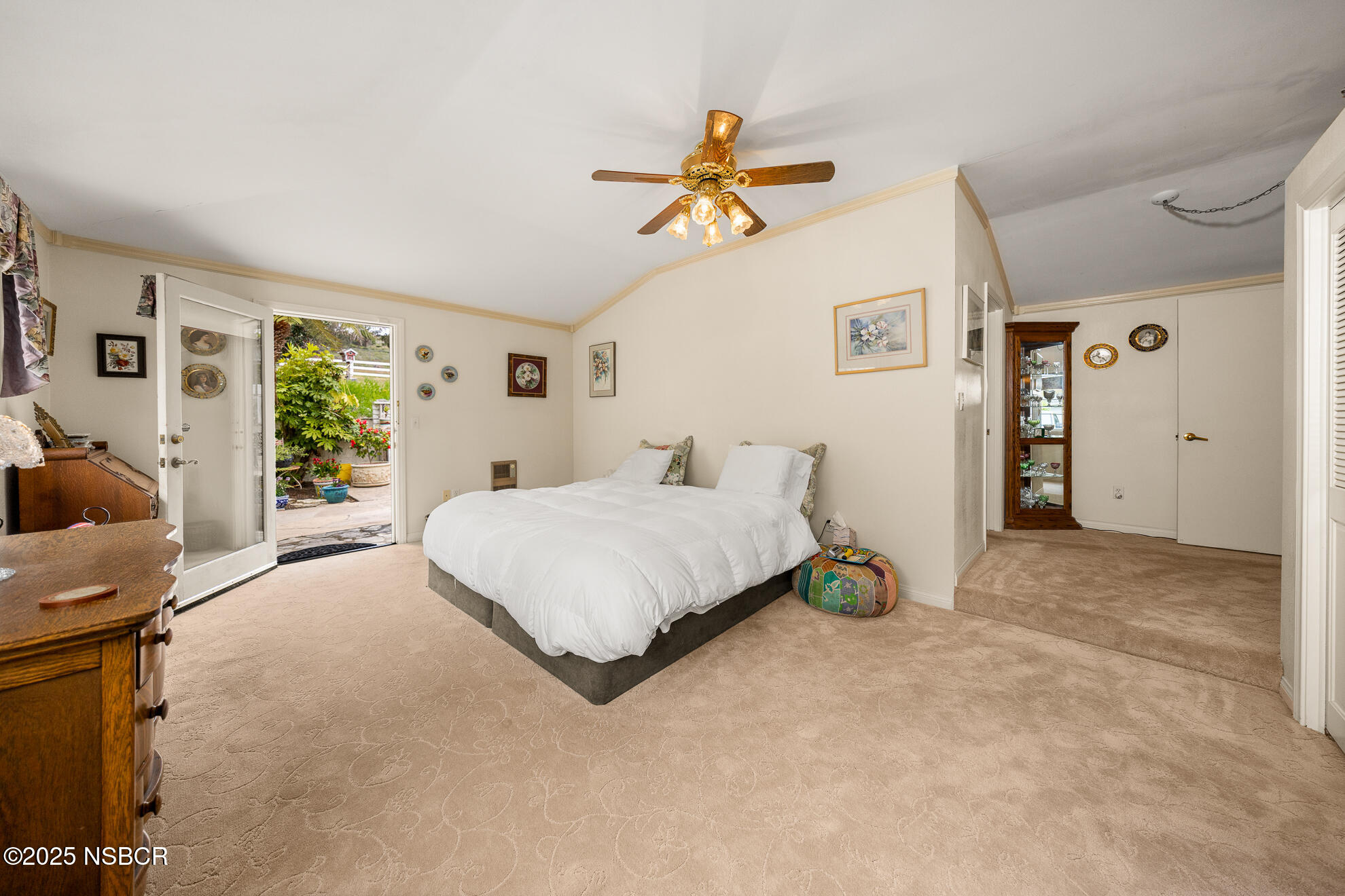 4314 West Ocean Avenue Lompoc, CA 93436 - Photo 23 of 58 a bedroom with a bed and ceiling fan