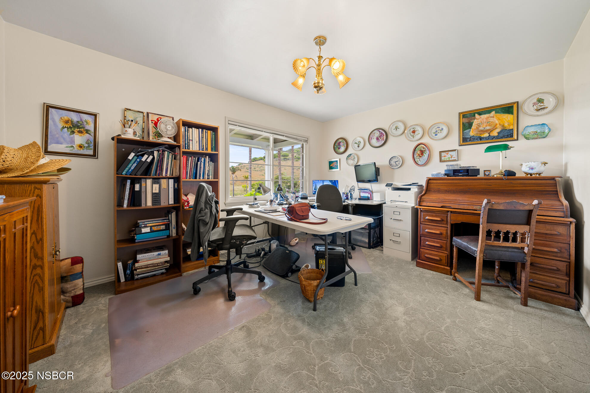 4314 West Ocean Avenue Lompoc, CA 93436 - Photo 27 of 58 a view of a workspace with furniture and toys