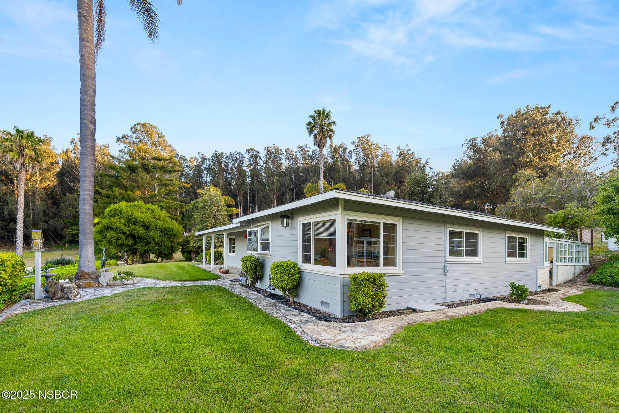 4314 West Ocean Avenue Lompoc, CA 93436 - Photo 31 of 58 a view of a house with backyard and garden
