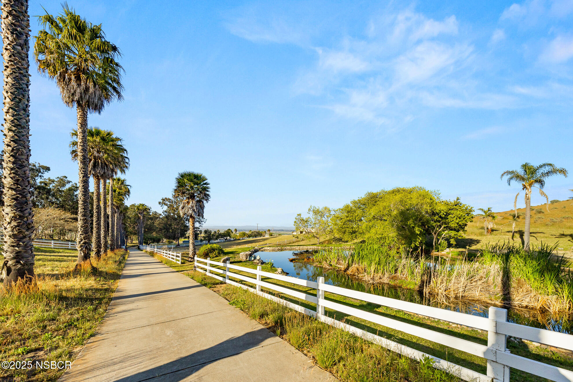 4314 West Ocean Avenue Lompoc, CA 93436 - Photo 35 of 58 a view of swimming pool with a table and chairs